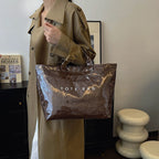 Women's retro letters print tote bag by Arenzza featuring a colorful, vintage-inspired design and sturdy fabric handles.