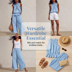 A woman wearing a sleeveless smocked neck top and matching pants set by Arenzza, stylish and casual clothing for women.