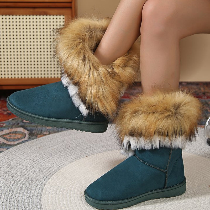 A pair of women's slip-on plush snow ankle booties from Arenzza featuring soft, cozy material and stylish winter footwear design.