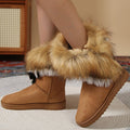 A pair of women's slip-on plush snow ankle booties by Arenzza with cozy fur lining and smooth exterior.