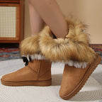 A pair of women's slip-on plush snow ankle booties by Arenzza with cozy fur lining and smooth exterior.