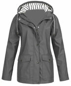 Women’s waterproof and windproof jacket by Arenzza, shown in a stylish, functional outdoor jacket with hood and zipper detail.