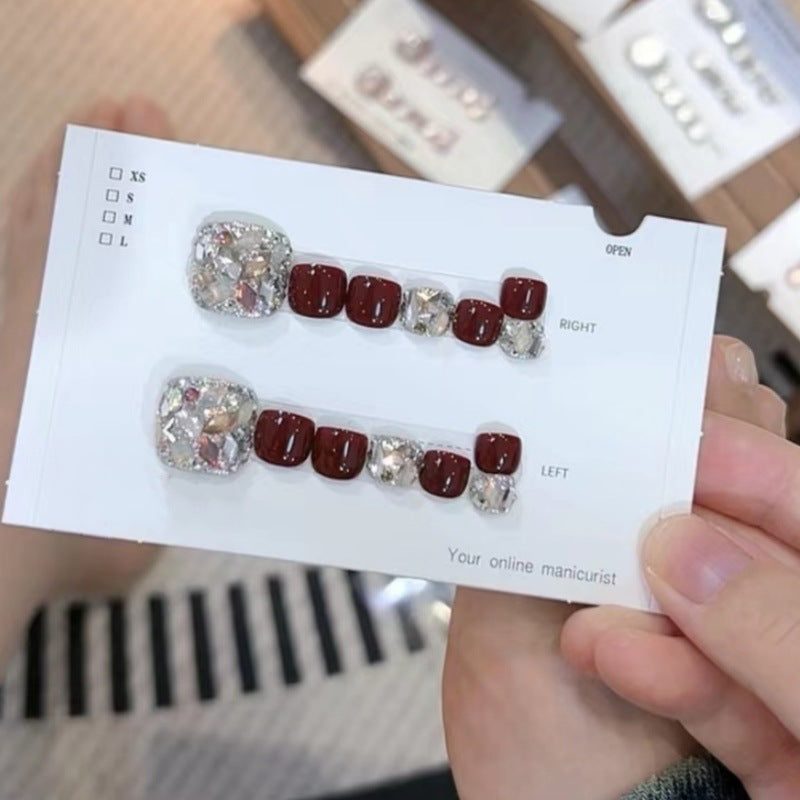 A set of 14 square press-on toenails by Arenzza, displayed in organized sheets with natural nail designs and finishes.