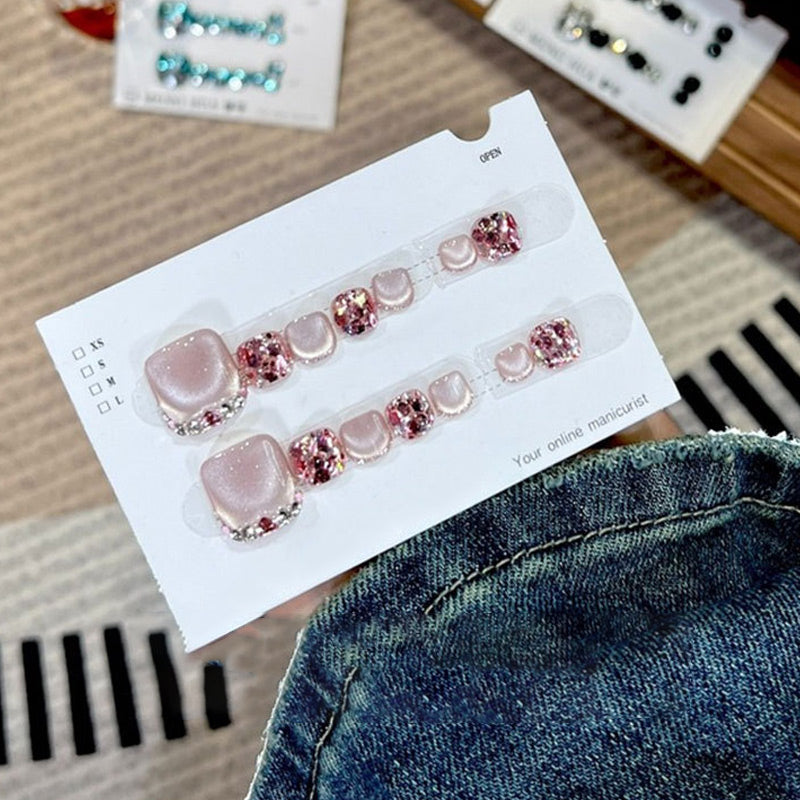 A set of 14 square press-on toenails by Arenzza, neatly arranged on a white background for cosmetic use.