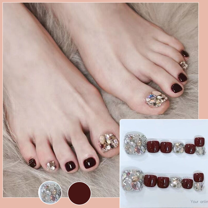 A set of 14 square press-on toenails by Arenzza, arranged neatly on a white background.