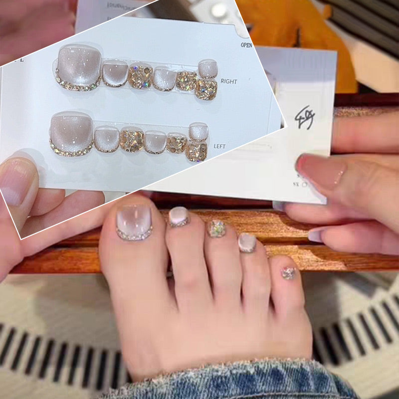 A set of 14 square press-on toenail sheets by Arenzza, showing neatly stacked, ready-to-apply cosmetic nail enhancements.