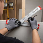 A person using the Arenzza AlignMax™ precision woodworking tool to make accurate cuts on a wooden board in a workshop.