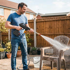 Arenzza AquaBlast™ cordless power cleaner in use, cleaning surfaces in a modern home with a user holding the device.