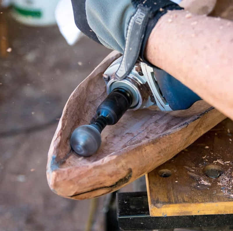 Arenzza Carvex™ wood sculpting tool in use, showcasing its ergonomic design and precision tip for effortless carving.