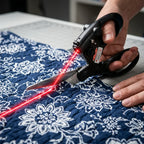 Arenzza LaserGuide™ laser-guided metal scissors used by a person for precise cutting in a lifestyle scene.