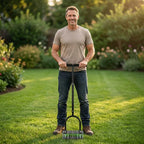 A person using the Arenzza automatic self-cleaning lawn aerator to improve grass health in a lush backyard.