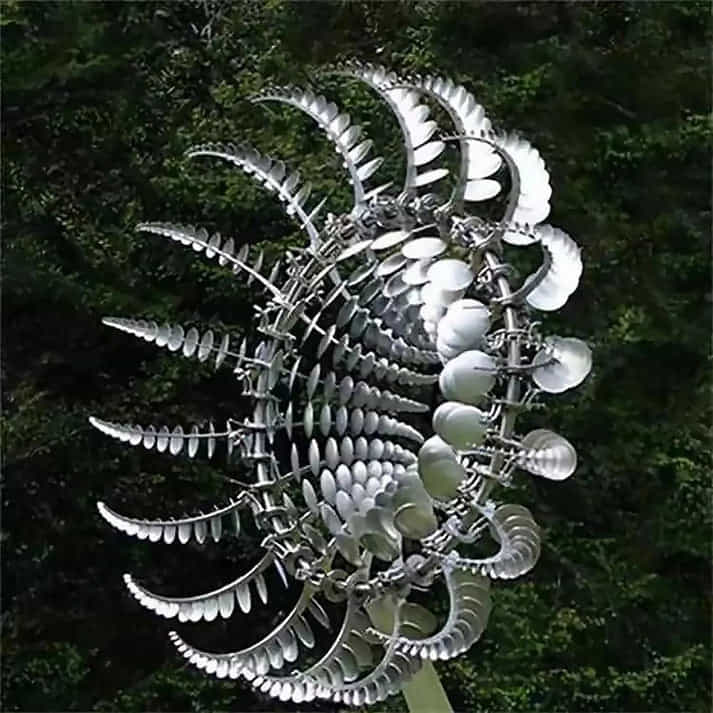 Aarenza metal garden windmill with weather-resistant design, outdoor decorative windmill with intricate metal craftsmanship in a garden setting