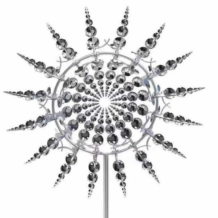 Arenzza metal garden windmill as weather-resistant outdoor decor with a magical, whimsical design in a garden setting.