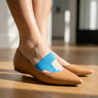 A woman wearing the Arenzza Quietstep™ Elastic Bunion Relief Wrap, demonstrating how it provides support and comfort for bunion relief.