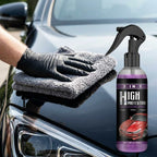 A person applying ShineGuard™ ceramic car coating by Arenzza on a car in a bright outdoor setting, showcasing the 3-in-1 protective spray.