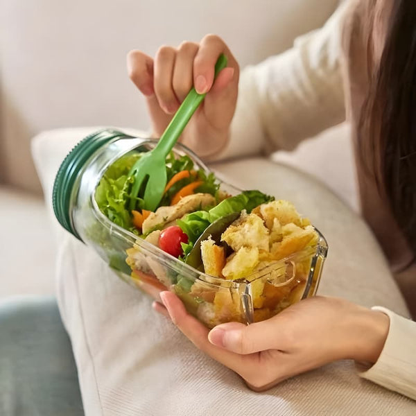 Arenzza SmartMix™ kitchen gadget for keeping greens crisp and fresh, shown in use with fresh leafy vegetables.