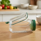 Arenzza SmartMix™ device keeping greens crisp and fresh, shown on a kitchen countertop with fresh vegetables.
