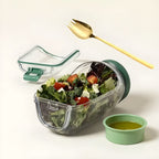 Arenzza SmartMix™ device keeping fresh greens crisp and vibrant in a clear bowl, emphasizing freshness and kitchen use.