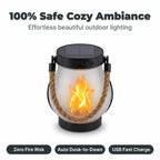 Arenzza EverFlame Solar Lantern with a warm, flickering flame design, illuminated outdoors at night, showcasing its ambient lighting.