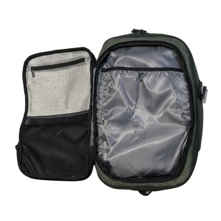 Arenzza Vakuback™ packable storage bag with vacuum seal, shown filled with clothes to save space without bulk.