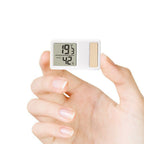 Arenzza 2-in-1 digital temperature and humidity meter with display, showing readings on a sleek electronic device.