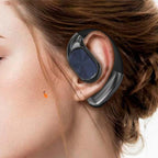 Arenzza wireless open-ear earbuds showing lightweight design and clear sound, suitable for outdoor activities, in a close-up shot.