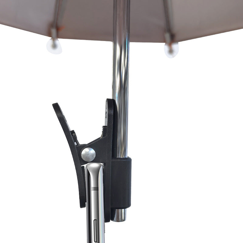 Arenzza clip-on phone umbrella sun shade attached to a smartphone, providing shade and protection from sunlight during outdoor use.