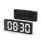 Arenzza minimalist digital alarm clock displaying time on a sleek black screen, designed for bedroom and office use.