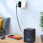 Arenzza wireless Bluetooth 5.0 audio receiver connected to a smartphone, showcasing compact electronic accessories for audio streaming.