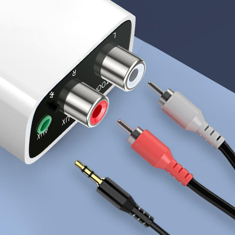Arenzza wireless Bluetooth 5.0 audio receiver connected to a device, compact electronic accessory for wireless music streaming.