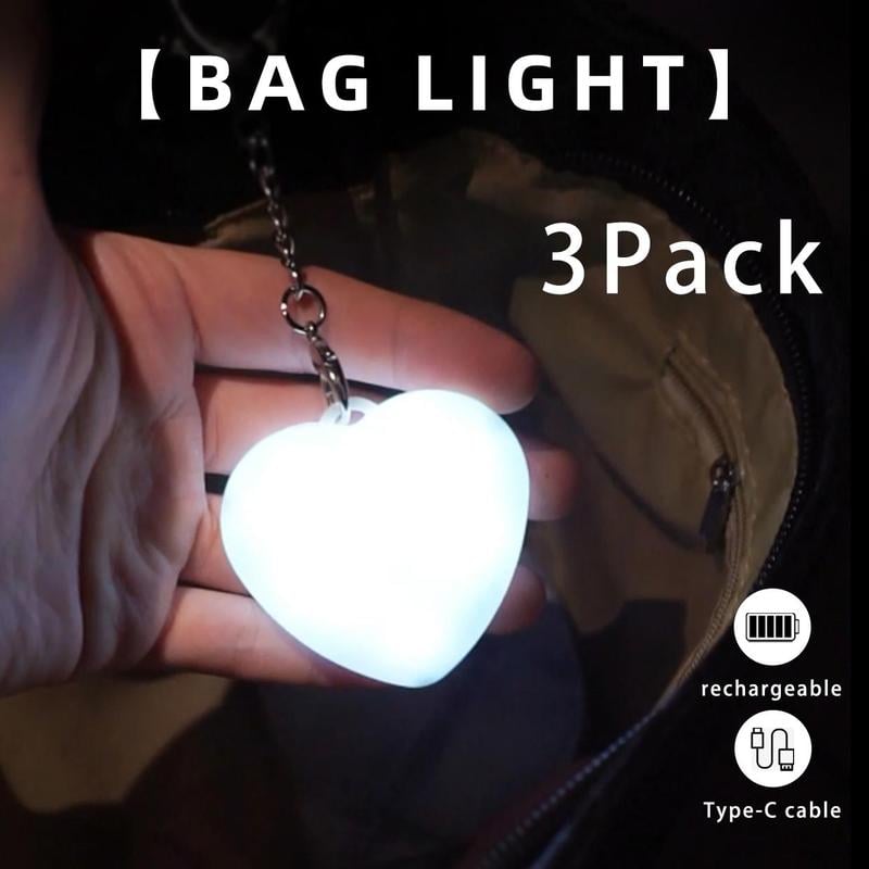 Arenzza LED touch sensor bag light with white LED, compact electronics accessory illuminated in a sleek black case.