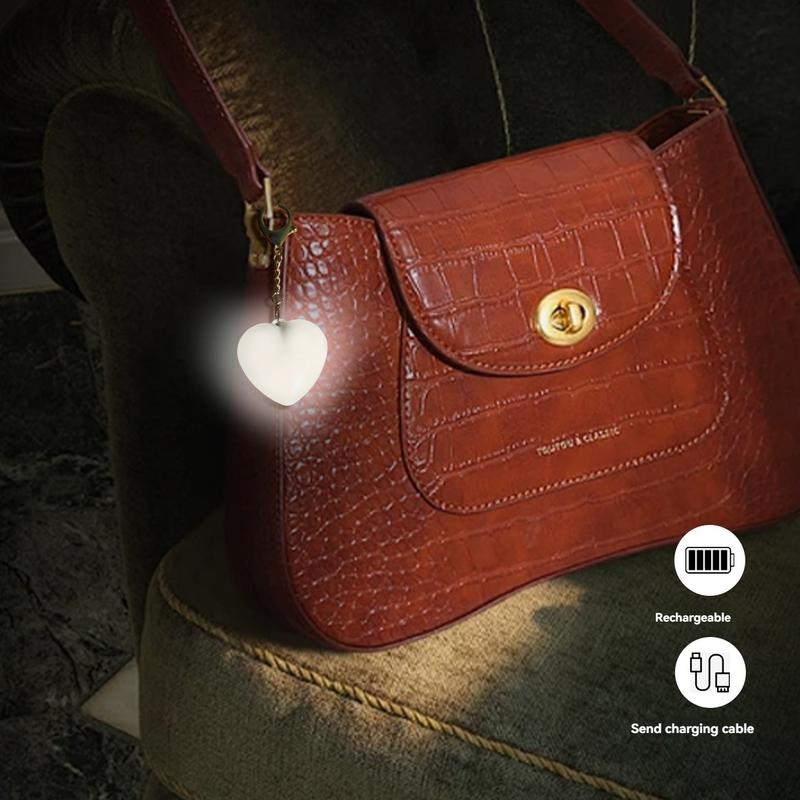 Arenzza LED Touch Sensor Bag Light with sleek design, illuminated switch, and compact size for easy attachment to bags.