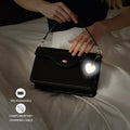 Arenzza LED Touch Sensor Bag Light glowing white, compact electronic accessory with touch activation for easy use.