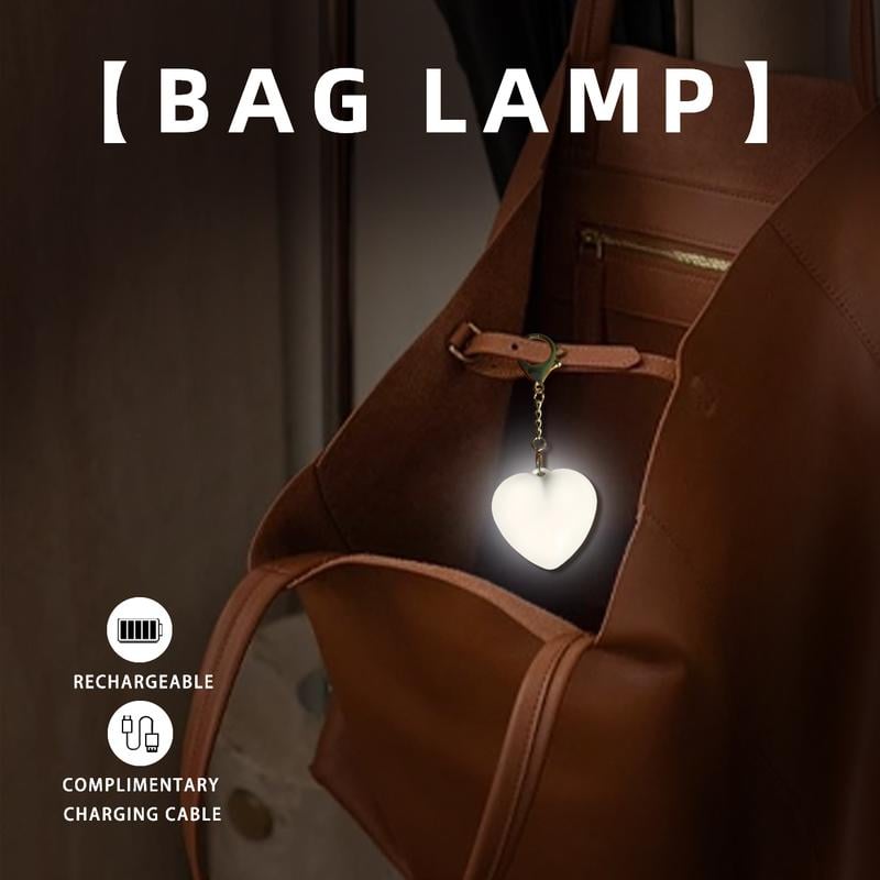 Arenzza LED touch sensor bag light showing illuminated white LED in compact electronic accessory for bags and pockets.