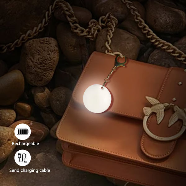 Arenzza LED touch sensor bag light with white LED, compact electronic accessory, showing the light turned on and off.