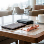 Arenzza fast-charging adapter with a 360° foldable phone stand, compact electronics accessory for convenient charging and device support.