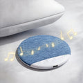 Arenzza pillow speaker for sleeping, compact electronic accessory with soft fabric cover, designed for relaxing audio experience.