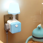 Arenzza 2-in-1 Cube Socket LED Night Lamp plugged into an electrical outlet, providing soft ambient lighting.