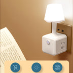 Arenzza 2-in-1 Cube Socket LED Night Lamp plugged into an electrical outlet, providing soft ambient light for a bedroom or living space.