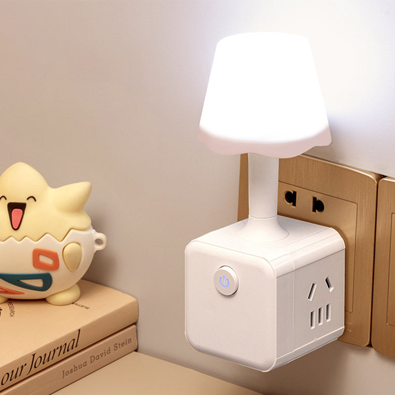 Arenzza 2-in-1 Cube Socket LED Night Lamp plugged into an electrical outlet, providing soft ambient lighting in a modern setting.