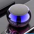 Arenzza Mini HiFi Bluetooth speaker showing a compact black electronic device with control buttons and a speaker grille.