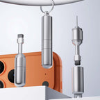 Arenzza 2-in-1 earphone cleaning brush and SIM ejector pin with portable multi-tool design, shown in a sleek, compact form.