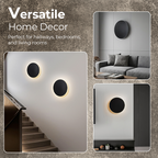 Arenzza modern round LED wall sconce mounted on a wall, showcasing sleek, contemporary electronic lighting design.