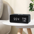 Arenzza LED digital alarm clock with wireless charging station, showing time display and modern electronic design.