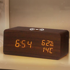Arenzza LED digital alarm clock with wireless charging station, showing time display and sleek electronic design.