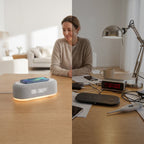 Arenzza 6-in-1 wireless charging station for electronics with multiple charging pads and USB ports on a sleek black surface.