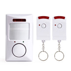 Infrared motion sensor alarm by Arenzza with two remote controls, electronic security device with motion detection feature.