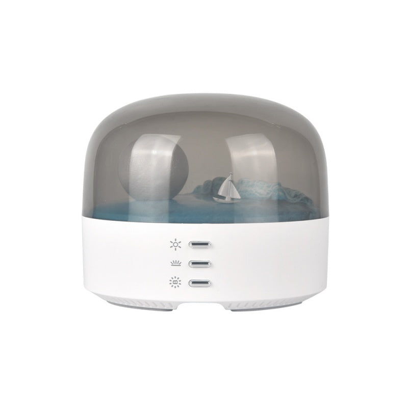 Arenzza Moon Sea Landscape LED night light speaker showing a moon and sea scene with glowing LED lights and speaker grille.