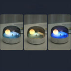 Arenzza Moon Sea Landscape LED night light speaker showing a moon and ocean scene with illuminated LEDs and control buttons