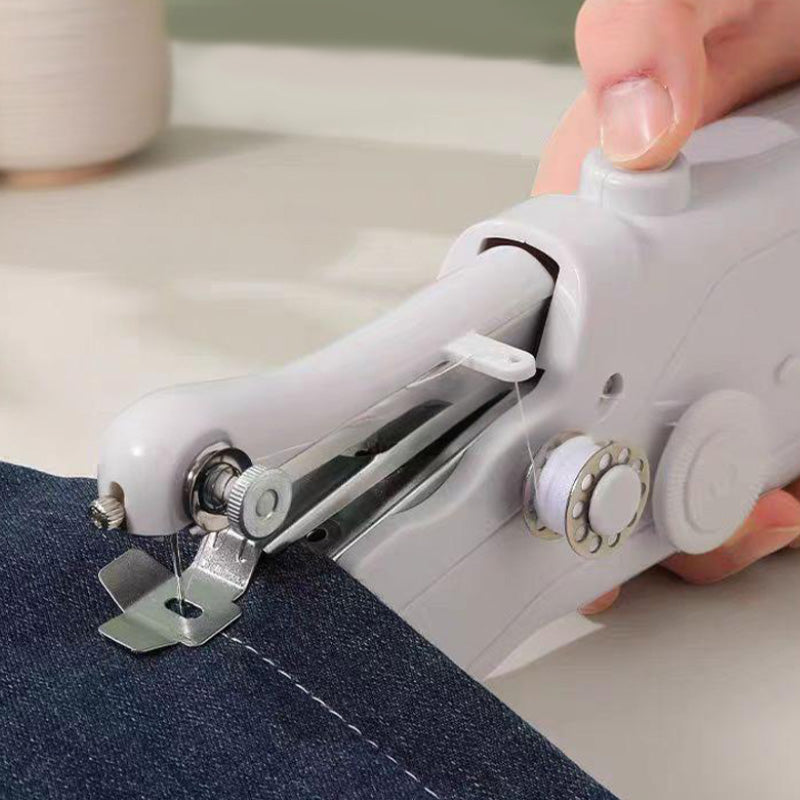 Arenzza mini electric sewing machine in white and pink, lightweight and portable, with a compact design for easy sewing projects.